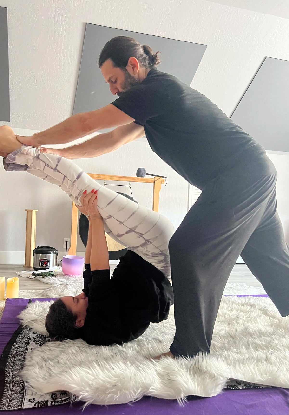 Traditional Thai massage treatment space designed for assisted stretching, acupressure, and energy line work