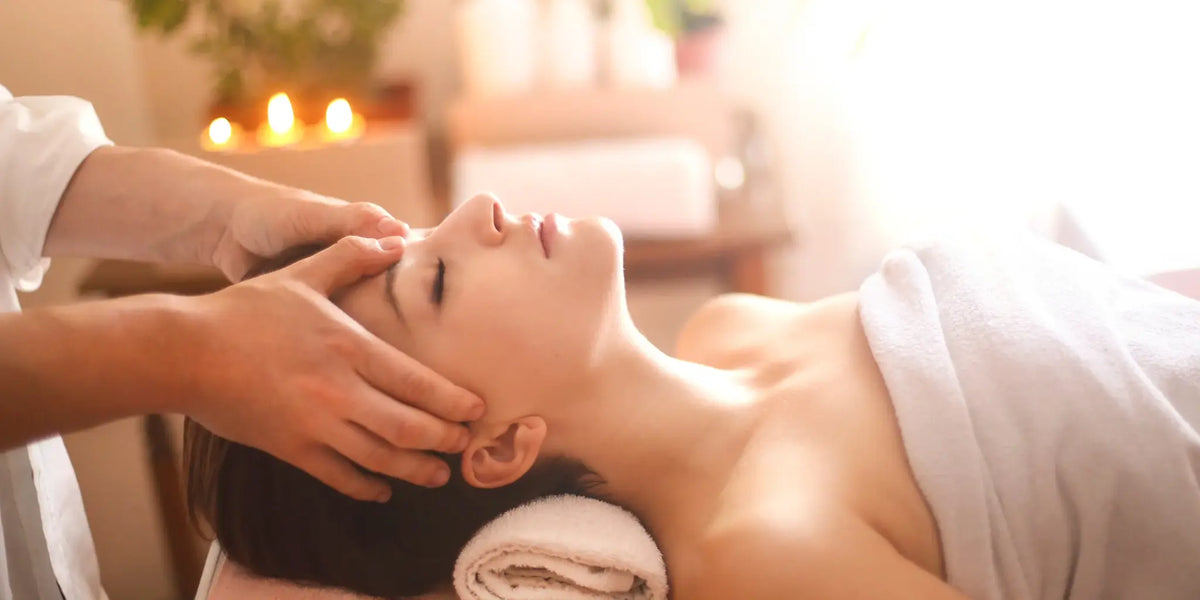 Brow artist performing precision shaping to enhance natural facial features and symmetry