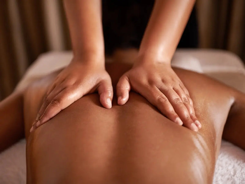 Guest enjoying a therapeutic massage treatment for relaxation and restoration