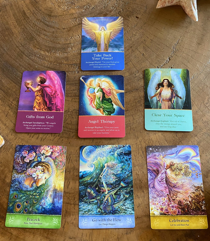 Oracle card reading session offering intuitive guidance, clarity, and personal insight through spiritual divination