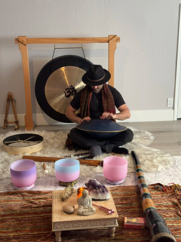 Sound bath healing session using singing bowls, gongs, and vibrational instruments for deep relaxation